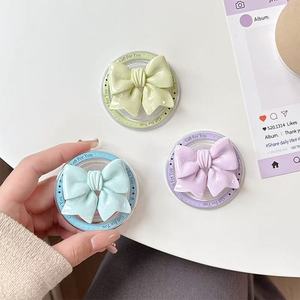 Bowknot Phone Grips Soporte de teléfono para <span class=keywords><strong>iPhone</strong></span> 17 16 15 Soporte de teléfono celular transparente plegable Accesorio Soporte magnético - Product Image 4