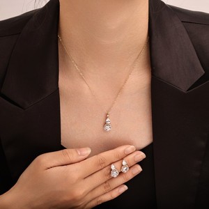 Ensemble de boucles d'oreilles et collier en cuivre plaqué or avec perles brillantes, forme goutte d'eau, bijoux de fête, bijoux de luxe pour femmes - Product Image 2