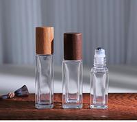 Botol Roller Kaca Berkualitas Tinggi dengan Tutup Bambu Alami, Wadah Roll-on Isi Ulang yang Ramah Lingkungan untuk Minyak Esensial Perawatan Kulit