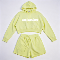 Ensemble de survêtement personnalisé pour femme, coupe ajustée, printemps-automne, avec cordon de serrage, respirant, comprenant un sweat à capuche décontracté et un short de sport, idéal pour le fitness et le sport.