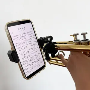 Nuevo diseño de alta calidad de rotación libre soporte de música alto soporte de teléfono celular para trompeta