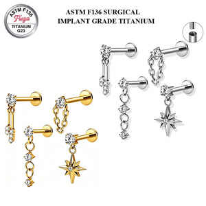 Pendiente de titanio ASTM-F136 Freya con rosca interna, cadena colgante y estrella de circonita cúbica para piercing de hélix, tragus y cartílago. - Product Image 1