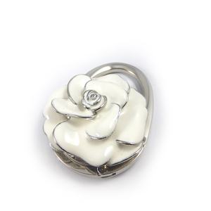 Vente flash : Porte-sac pliable à trois motifs interchangeables, support de sac portable pour table - Product Image 1