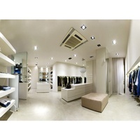 Meubles de présentation pour boutique de mode, table à vêtements, étagère, solution d'aménagement intérieur pour magasin
