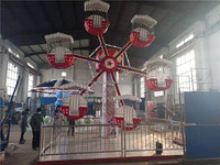 Mini grande roue personnalisée Équipement de parc d'attractions pour enfants d'intérieur Jeux de Noël d'extérieur en métal fabriqués à Zhengzhou