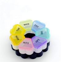 Nouvelle conception, boîte à pilules ronde personnalisée en plastique pour 7 jours, forme de fleur, boîte à pilules ronde de qualité alimentaire pour 7 jours, pour les voyages