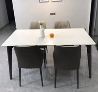 Table de salle à manger blanche en pierre frittée moderne de luxe et 4 6 chaises en cuir PU