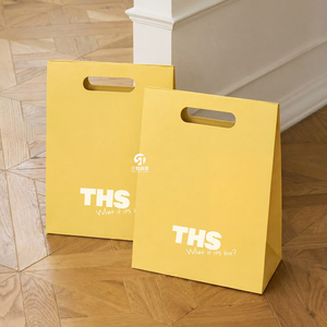 Bolsas de Regalo de Papel Kraft con Logotipo Personalizado de Alta Calidad, Bolsas de Compras Gruesas con Asas para Ropa de Moda, Embalaje Minorista y Promociones - Product Image 1