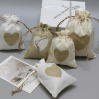 Pochette en jute avec cordon de serrage et logo cœur, écologique, vente en gros, directement de l'usine, pour mariage