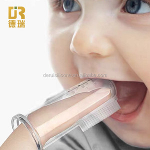 Cepillo <span class=keywords><strong>de</strong></span> dientes <span class=keywords><strong>de</strong></span> dedo <span class=keywords><strong>de</strong></span> bebé <span class=keywords><strong>de</strong></span> <span class=keywords><strong>silicona</strong></span> <span class=keywords><strong>de</strong></span> goma <span class=keywords><strong>de</strong></span> mano flexible suave <span class=keywords><strong>de</strong></span> grado alimenticio - Product Image 1