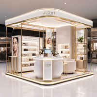 Kiosque de vente de produits de soin de la peau de luxe, îlot d'exposition pour centre commercial de beauté, éclairage LED |   Présentoir cosmétique en acier inoxydable doré écologique