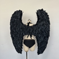 Ailes d'ange en plumes noires personnalisées pour les accessoires de photographie de passerelle et les décorations d'événements