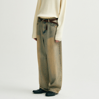 Jean baggy droit tendance 2026, délavage effet usé, bleu clair avec reflets jaunes, ourlet déchiré, pour homme, idéal au quotidien