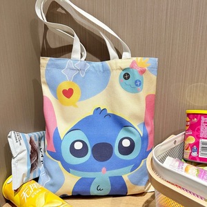 Borsa in tela all'ingrosso con cartone animato Stitch, borsa a tracolla semplice e carina, borsa tote di grande capacità, zaino scolastico in tela per studenti, peluche - Product Image 5