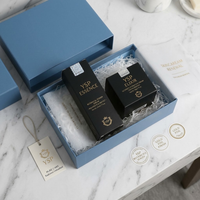 Ensemble d'emballages de luxe sur mesure pour soins de la peau bleus avec boîte cadeau rigide à couvercle personnalisé et garniture en raphia