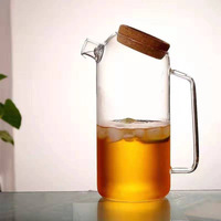 Carafe en verre borosilicate de haute qualité, design créatif et luxueux, transparente, épaissie, grande capacité, avec infuseur à thé et couvercle, pour boissons froides et chaudes, idéale pour les réceptions