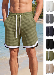 Nouveaux shorts de sport décontractés et élégants pour hommes, en tricot, à taille mi-haute, avec empiècements à carreaux, pour tous les jours et les vacances en Europe - Product Image 1