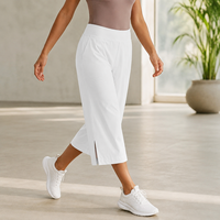 Pantalon de yoga capri blanc uni taille haute pour femme, coupe ample, jambe large, avec poches et fente latérale, idéal pour la gym et le yoga