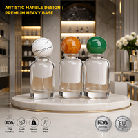 Flacon de parfum cylindrique de luxe Solent avec bouchon en boule texturée marbrée 30ml 50ml 100ml Bouteille en verre Emballage cosmétique Vente en gros