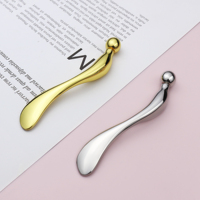 Outil de soin de la peau de luxe anti-gonflement, bâton de massage facial, masseur oculaire en métal rafraîchissant, applicateur de crème pour les yeux 2-en-1
