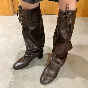 Bottes hautes pour femmes, boutons métalliques personnalisés de haute qualité, tige plissée ample, lacets, bottes longues et amples, bottes hautes jusqu'au genou - Product Image 1