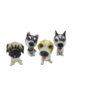 Cute doll simulation resin spring shake head dog car interior decoration lucky pet dog