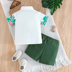 Ensemble de vêtements décontractés pour bébé garçon en deux pièces pour l'été, respirant, à manches courtes avec col et boutons imprimés dinosaures - Product Image 2