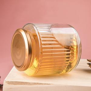 Vente en gros d'usine 50ml 100ml Pot en verre rond à rayures verticales transparent pour le stockage des aliments Contenant en verre pour la <span class=keywords><strong>confiture</strong></span> Pot à miel - Product Image 1