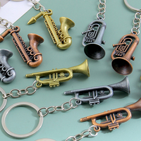 Nouveau design personnalisé en alliage de zinc, pendentif porte-clés trompette saxophone 3D simulé, cadeau souvenir musical étanche et tendance
