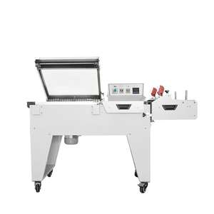 Manuelle 2-in-1 Schrumpffolienmaschine Folienverpackungs-Versiegelungsmaschine Schrumpfverpackungsmaschine zum Verkauf - Product Image 1