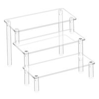 Présentoir en acrylique durable et transparent, trapézoïdal, multi-niveaux, pour cupcakes, parfums et poupées