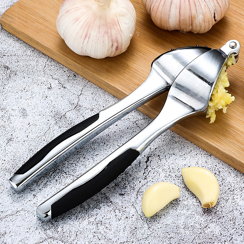Чесночный пресс с мягкой эргономичной ручкой, легко сжимаемой
