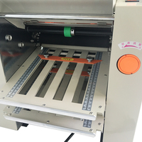 Machine à plier le papier entièrement automatique 220V 80m/min Largeur de travail maximale 310mm Pliage rapide et continu