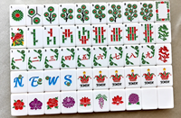 Vente en gros usine : Jeu de Mahjong américain en acrylique pour 4 joueurs, tuiles dorées et personnalisables en couleur, avec plateau de jeu peint