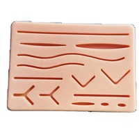 Coussinet de suture en silicone à simulation élevée, kit de formation à suture médicale, modèle de peau traumatique humaine