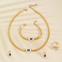 Ensemble de 4 colliers en acier inoxydable avec pendentifs lettre S et signe dollar, style Moyen-Orient