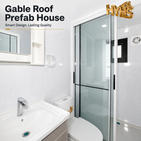 Maison conteneur ondulée à cadre noir de 20 pieds, 2 chambres, salle de bain complète, fenêtres coulissantes extensibles à double aile, moderne, ISO 9001 CE