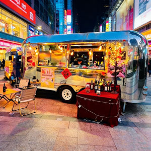 Chariot alimentaire mobile en acier inoxydable avec guirlandes lumineuses pour la vente de vin et de desserts, intérieur confortable - Product Image 4