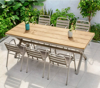 Ensemble de mobilier de salle à manger d'extérieur moderne en acier au carbone et alliage d'aluminium, avec coussins durables et imperméables, table et chaises pour parc et cour.