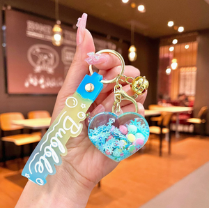 Acryl olie gevulde vloeibare zandfles dolfijn walvis sleutelhanger lichtgevende sneeuwvlok drijfles prachtige kinderrugzak auto - Product Image 2