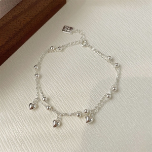 Pulsera Tichi minimalista, versátil y distintiva de plata S925 de doble capa con forma de corazón para mujeres con estilo discreto. - Product Image 1
