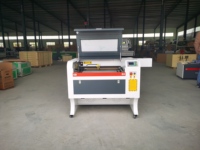 Mesin Pemotong dan Pengukir Laser CO2 China 80W Tipe Gantry PMI Berpendingin Air 6090 Mendukung DXF/DST untuk Dijual