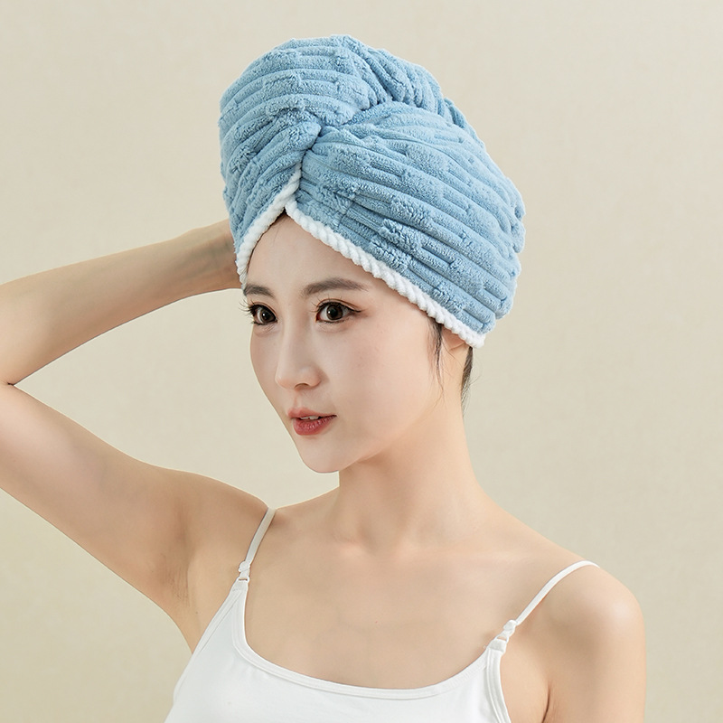 Gorro de secado para el cabello triangular azul de una sola capa.