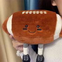 Peluche de football mignonne avec jambes, coussin en peluche doux en forme de ballon de rugby, cadeau en peluche sportif de dessin animé