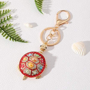 พวงกุญแจใส่เหรียญแฟชั่น ของที่ระลึกสำหรับผู้หญิง ดีไซน์สร้างสรรค์ รูปสัตว์ทะเลเต่า ประดับคริสตัลโอปอลและเพชรเทียม - Product Image 3