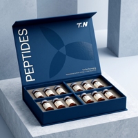 Boîte rigide personnalisée bleu marine et gris en carton ondulé pour 3 flacons de peptides, impression offset sur pulpe moulée, soins personnels