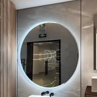 Miroir de salle de bain BATHNOLOGY Logo personnalisé LED miroir rond illuminé d'hôtel moderne pour miroirs de salle de bain de salon et d'hôtel