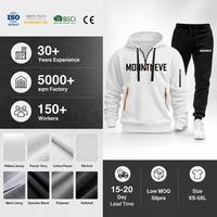 Conjunto de chándal de punto gofrado para hombre con sudadera con capucha, cremallera, bolsillos canguro, bolsillos con cremallera en las mangas, puños elásticos, estilo lounge y urbano, producción OEM