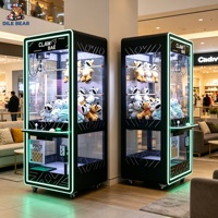 Machine à griffes distributrice de prix pour enfants et adultes, machine à grue moderne en métal noir, à monnayeur, jeu de compétences pour carnaval