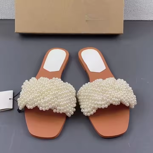2025 nuove scarpe da <span class=keywords><strong>donna</strong></span>: sandali bassi intrecciati con perla bianca per donne che indossano <span class=keywords><strong>infradito</strong></span> alla moda - Product Image 2